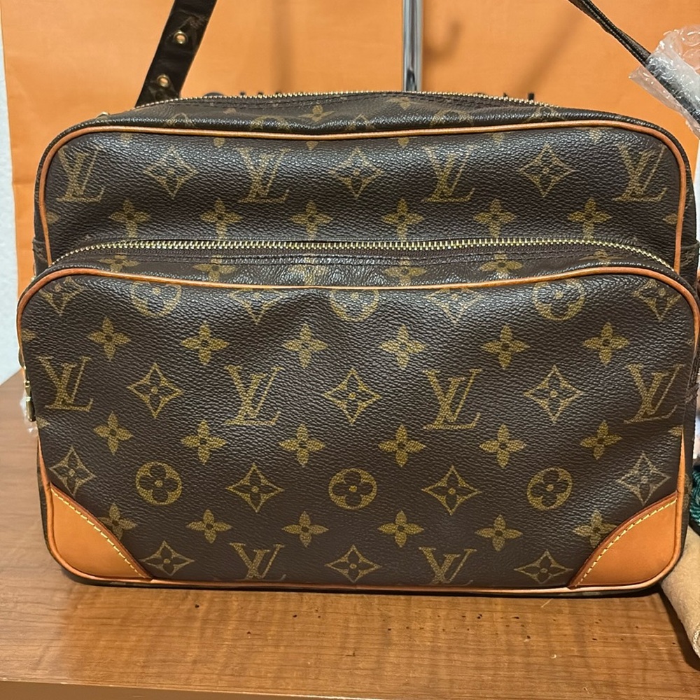 Louis Vuitton Monogram Nile Messenger Crossbody bag.
